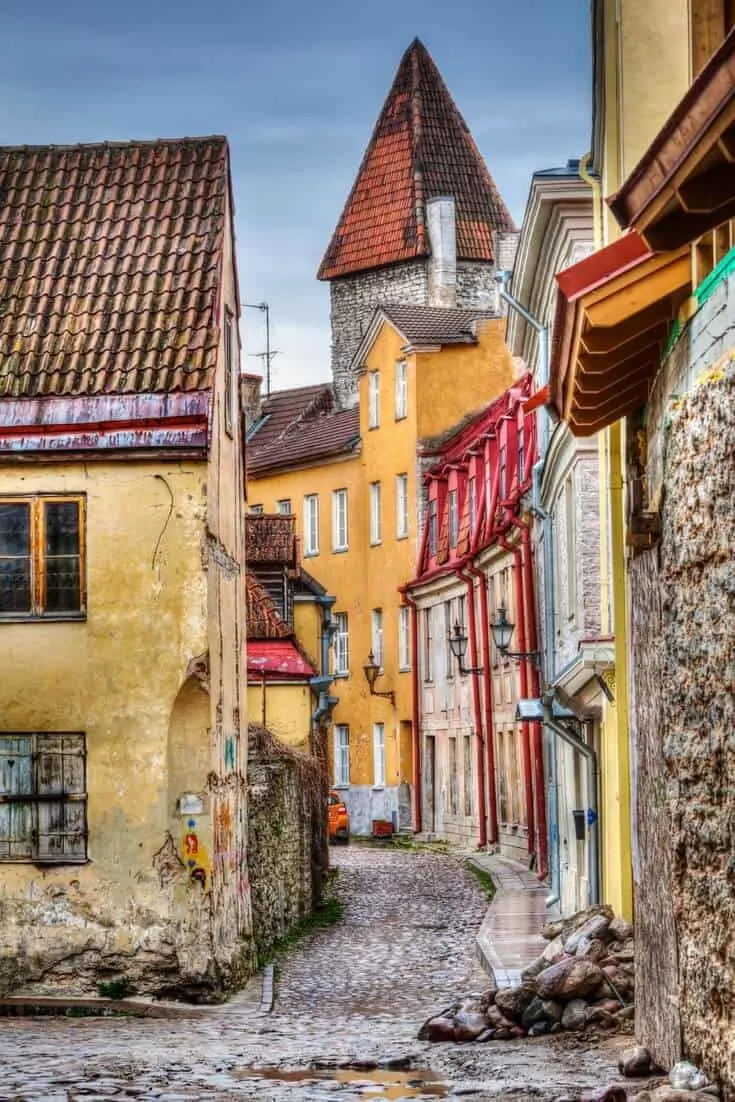 Tallinn Old Town with its colourful buildings, stone towers, cobblestone streets.