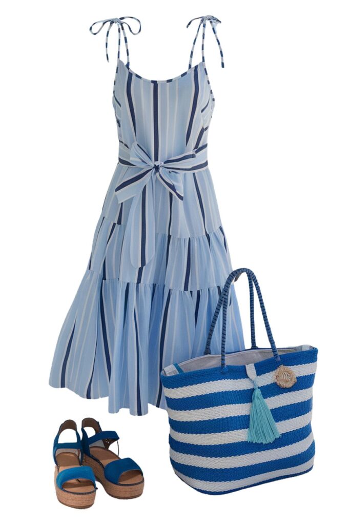 Blue striped summer dress with matching wedge sandals and a blue striped tote bag. Perfect beach outfit ensemble.