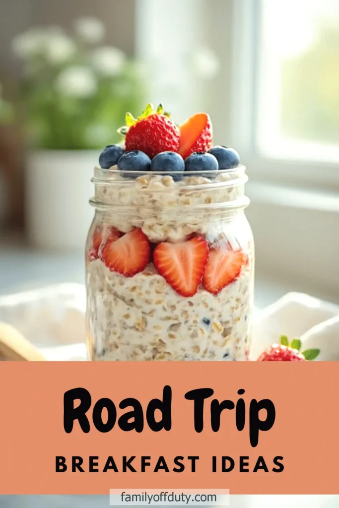 Jar of overnight oats topped with strawberries and blueberries, perfect for road trip breakfast ideas.