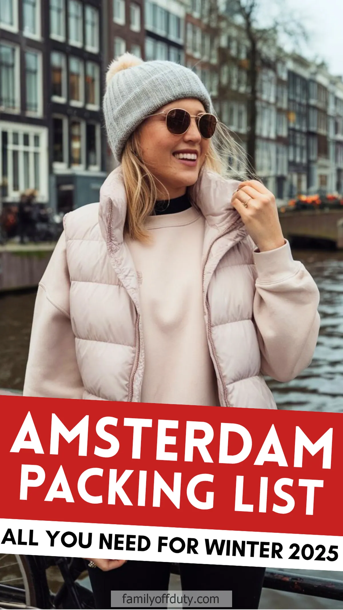 Woman in winter attire by Amsterdam canal, showing Amsterdam packing list for winter 2025.