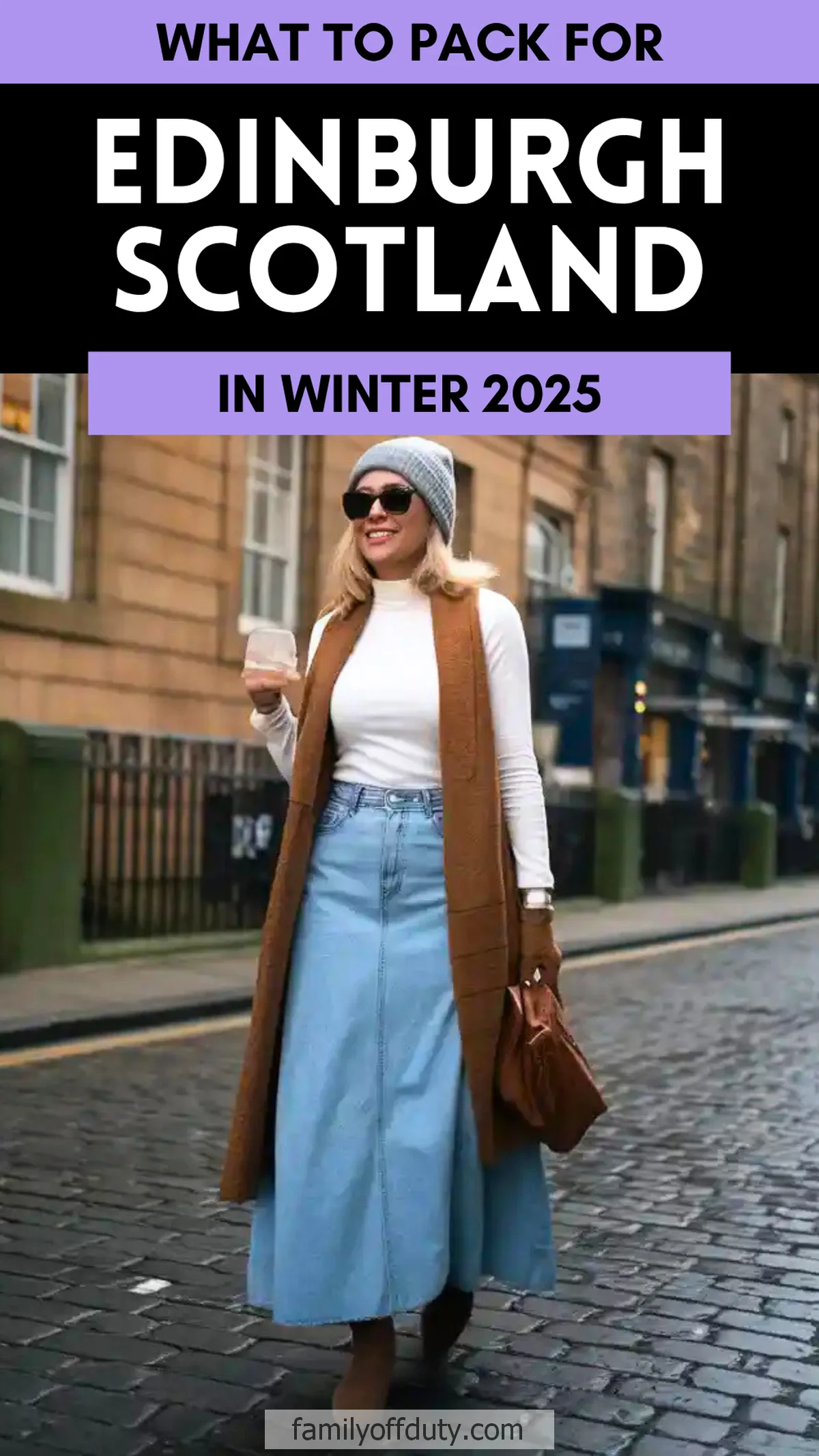Woman dressed for winter in Edinburgh, Scotland, holding coffee on cobblestone street, 2025 fashion.