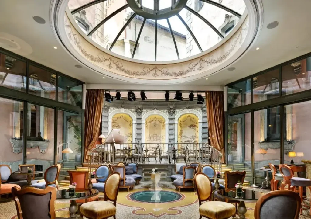 Elegant interior of a stylish lounge with a glass dome and ornate decor, perfect for relaxation and entertainment.