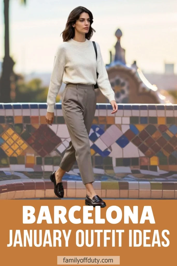 Woman in chic winter outfit walking in Barcelona, January fashion inspiration.